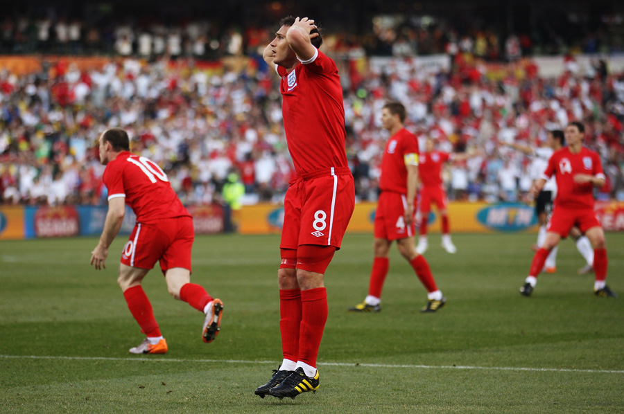 Frank Lampard holds his head in disbelief after seeing his goal ruled out